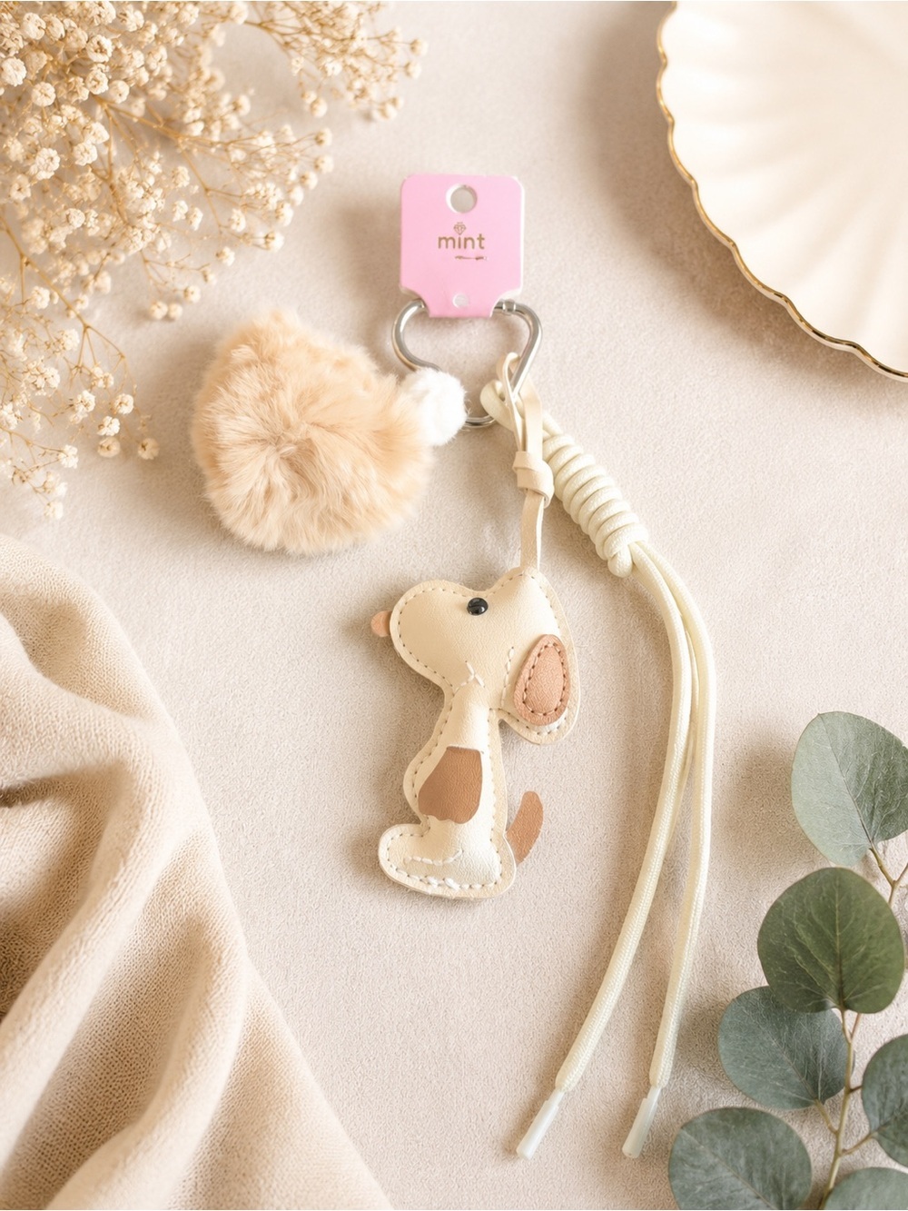 Snoopy ivory bag charm